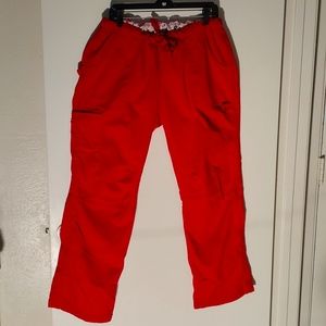 KATHY PETERSON, RED PANTS, SIZE L